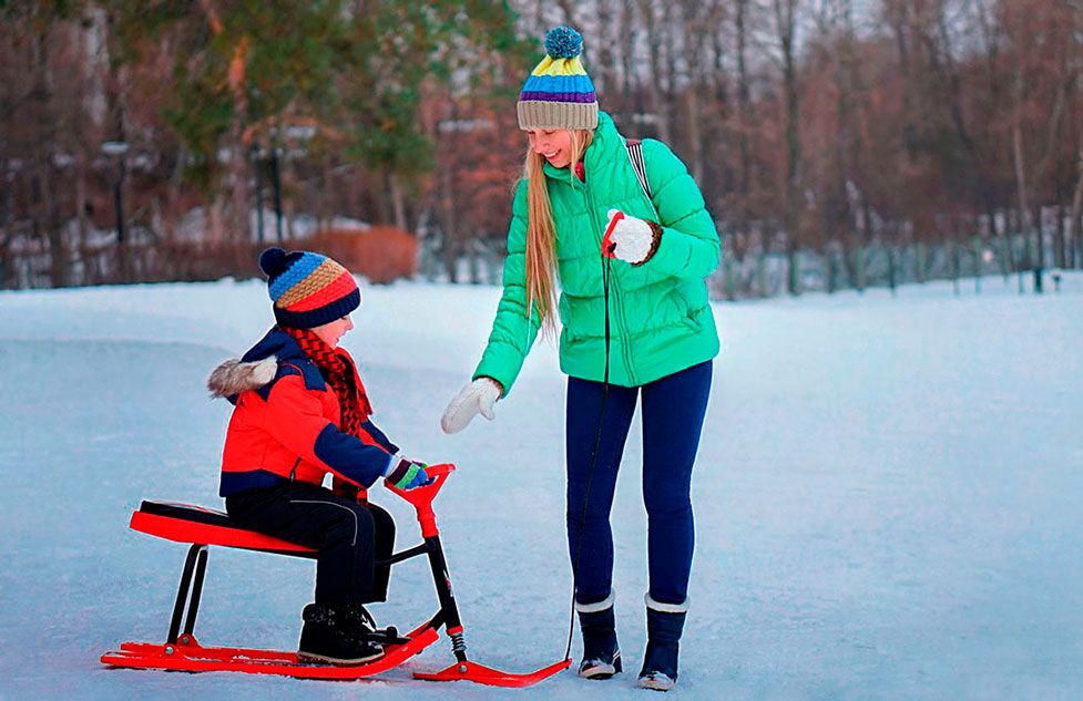 Mom and son playing in the snow